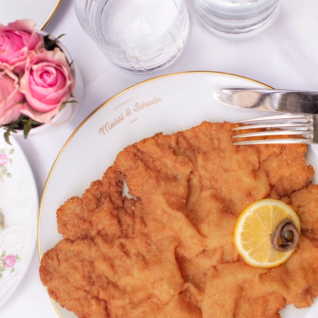 close up of a Wiener Schnitzel from the lengedary restaurant in Vienna, Meissl and Schadn