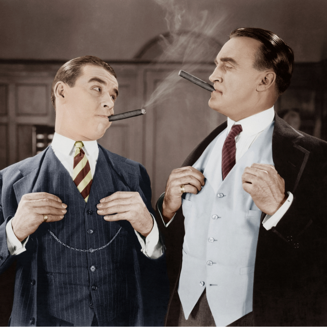 vintage photo with two guys smoking cigars and showing they are rich