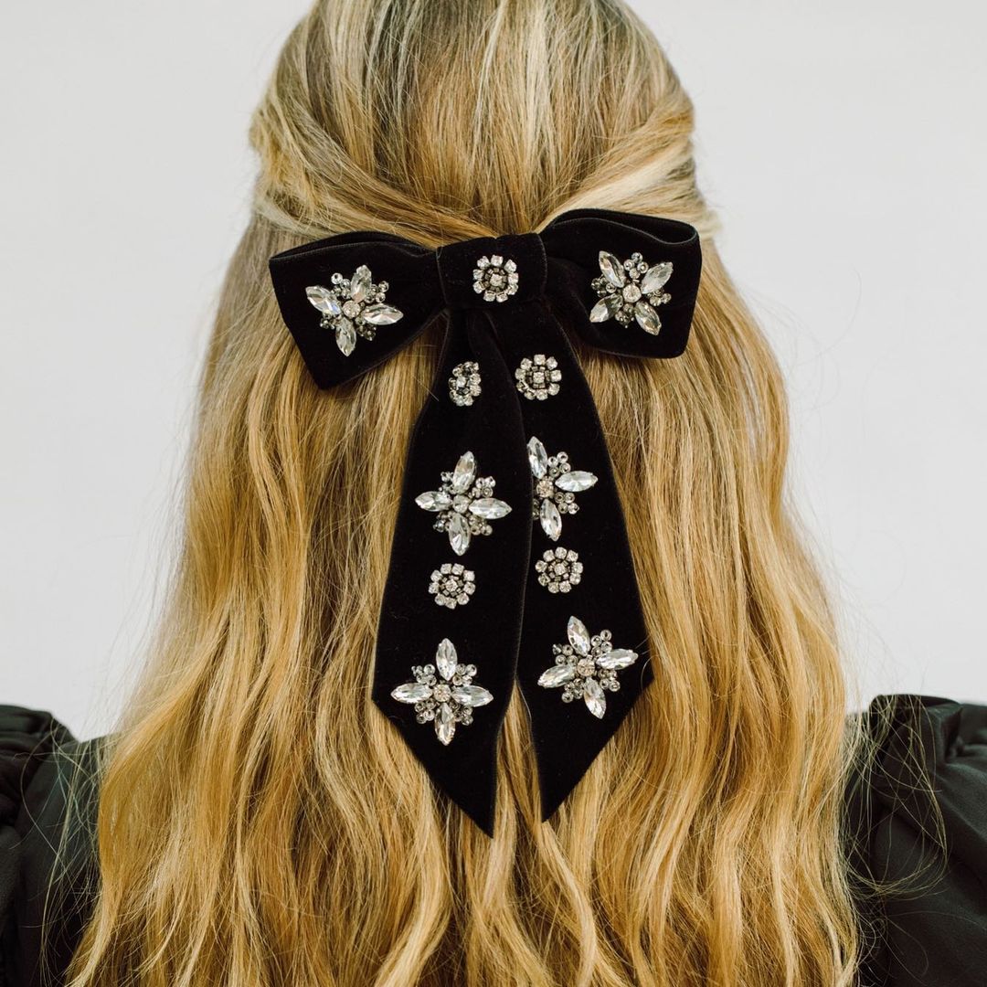 Xmas hairstyle with a glittering hair accessory to dress up the Christmas look.