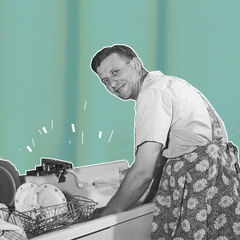 Husband help at home; men wearing an apron and washing the dishes in the kitchen sink.
