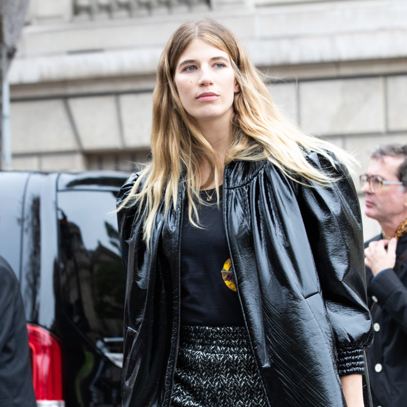 Veronika Heilbrunner at Paris fashion week wearing a puff sleeve black leather coat
