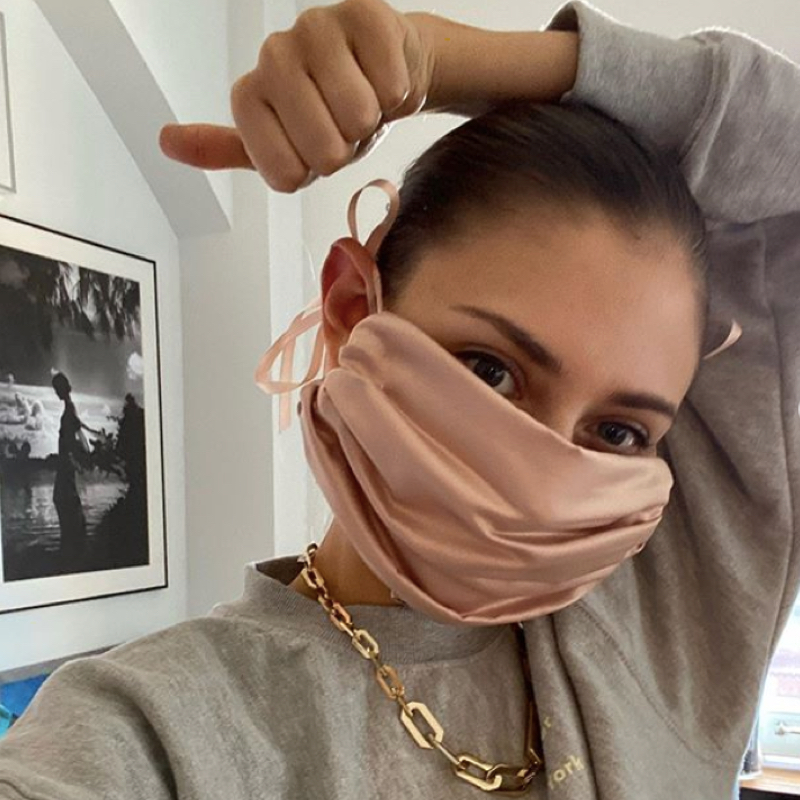 Instagrammer Jennymwalton wearing a Prada dust bag mask
