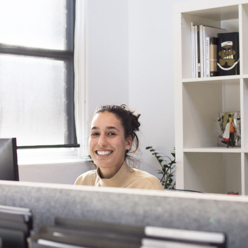 Woman smiling at the office.