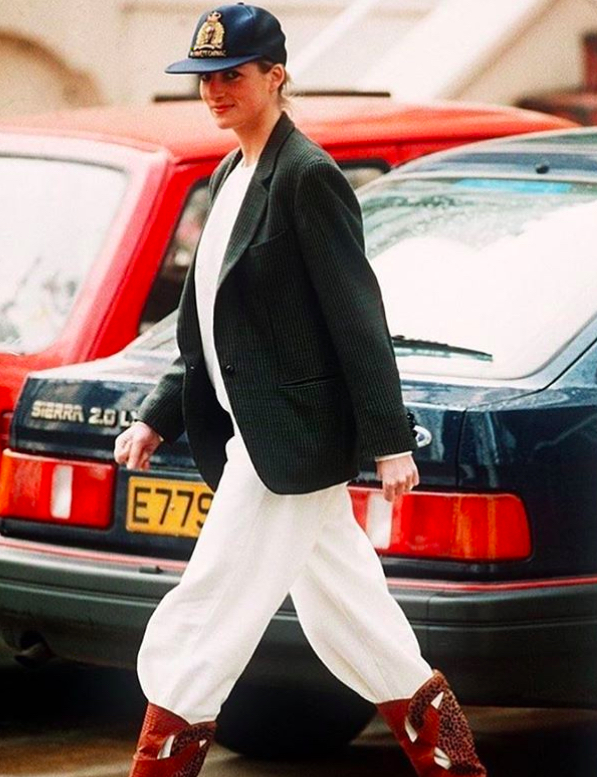 Princess Diana wearing wide-leg pants tucked into boots in the 90s.