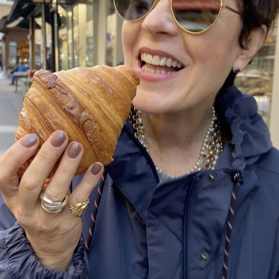 Eating a croissant from one of the best organic bakeries in Vienna.