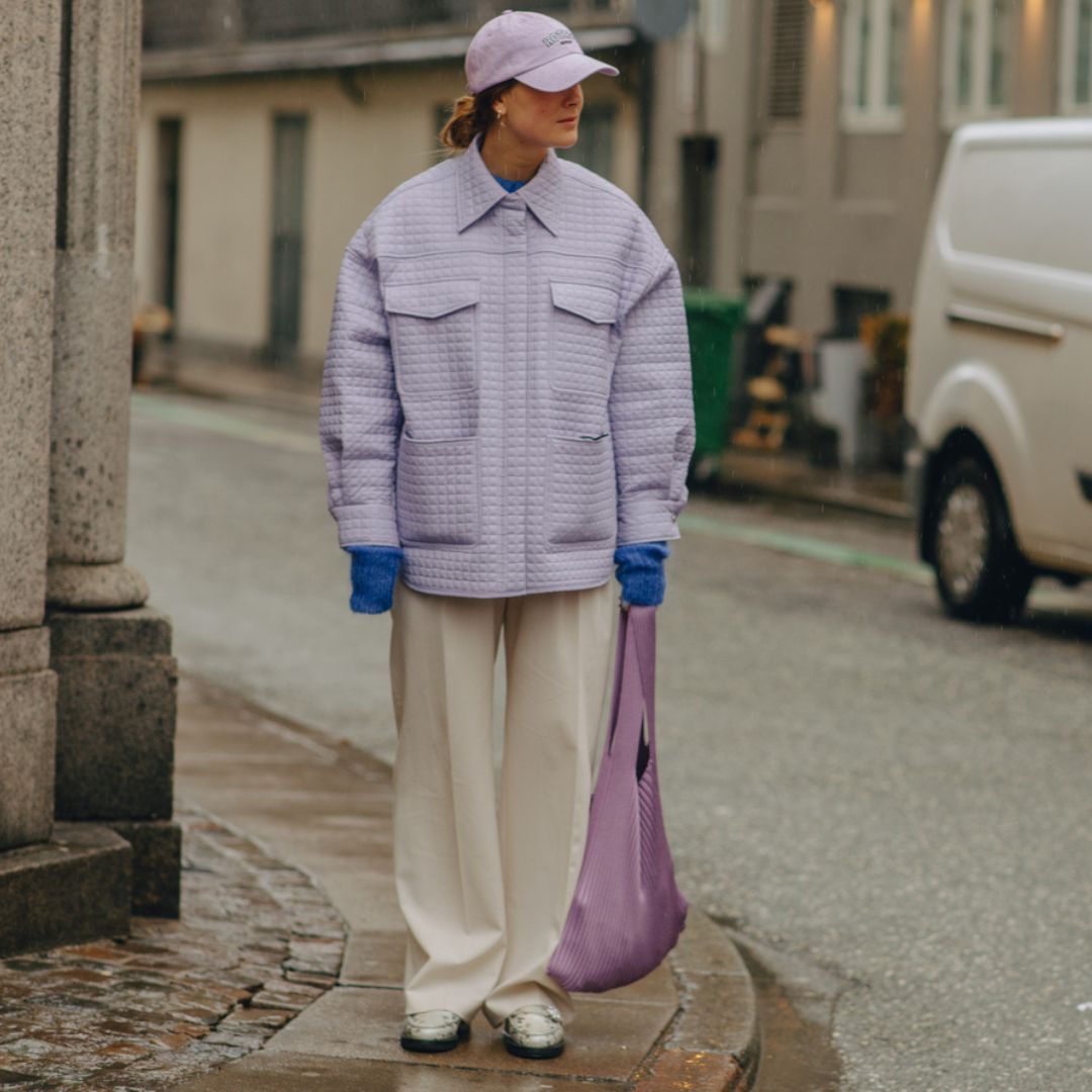 January wardrobe - fashionista wearing an off-white trousers and a lilac jacket