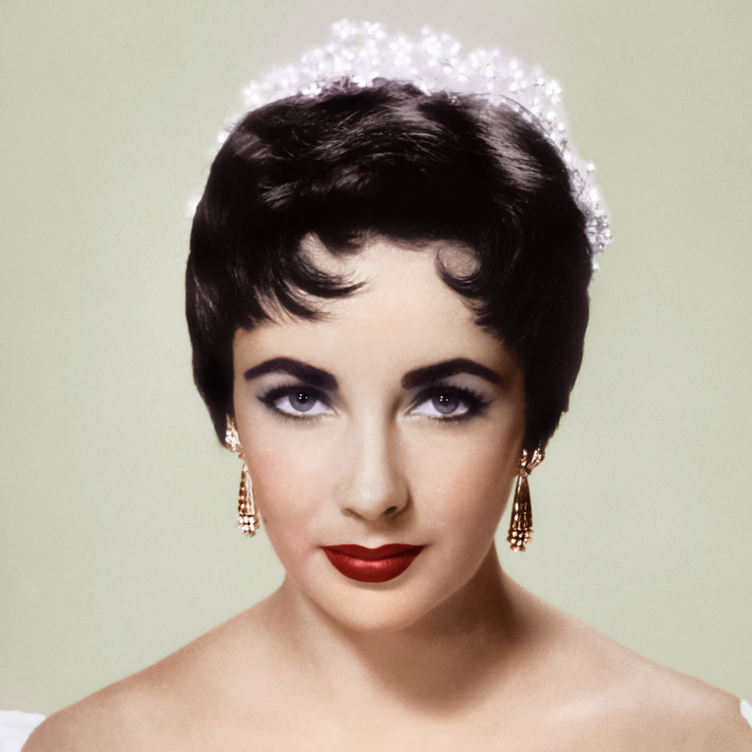 Elizabeth Taylor wearing some pieces f her jewellery collection.