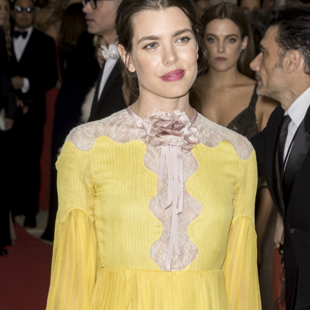 Charlotte Casiraghi wearing a yellow Gucci Gown on the red carpet