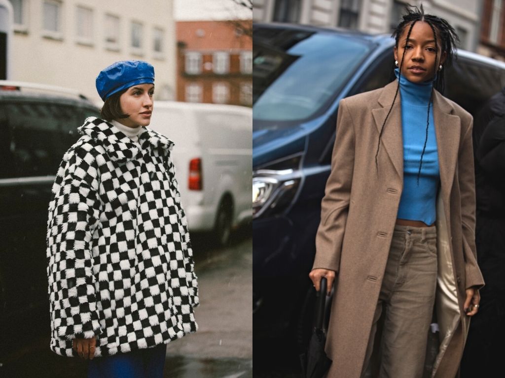 Two Danish girls in the streets of Copenhagen wearing a black and white checked coat and another wearing a neon blue turtleneck - colourful street style at CPHFW 22