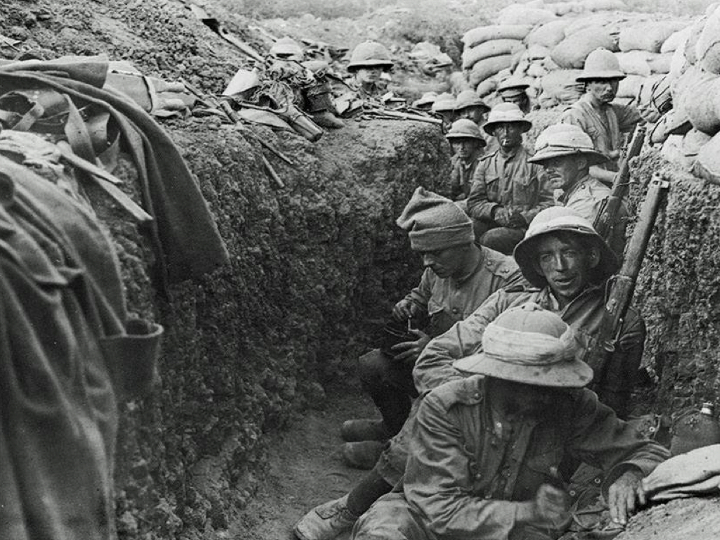 Soldiers in a trench wearing trench coat