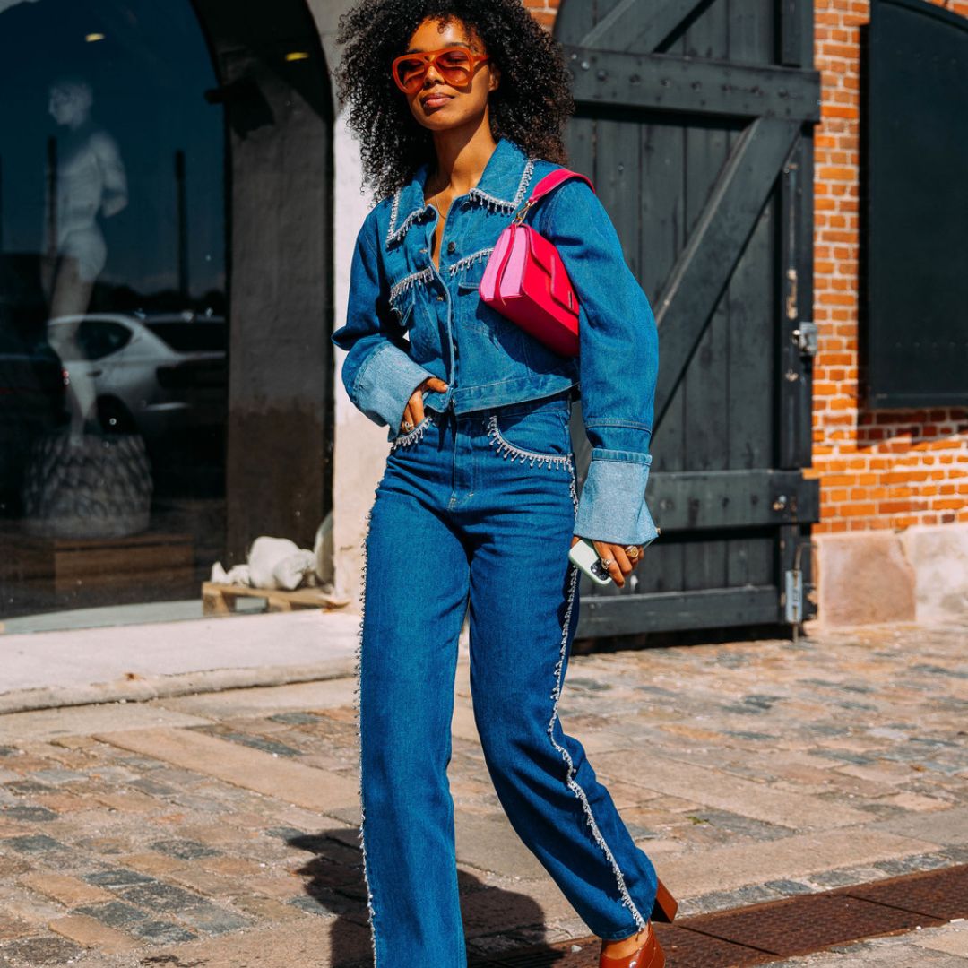 fashionista wearing a all denim outfit in the streets of Copenhagen fashion week