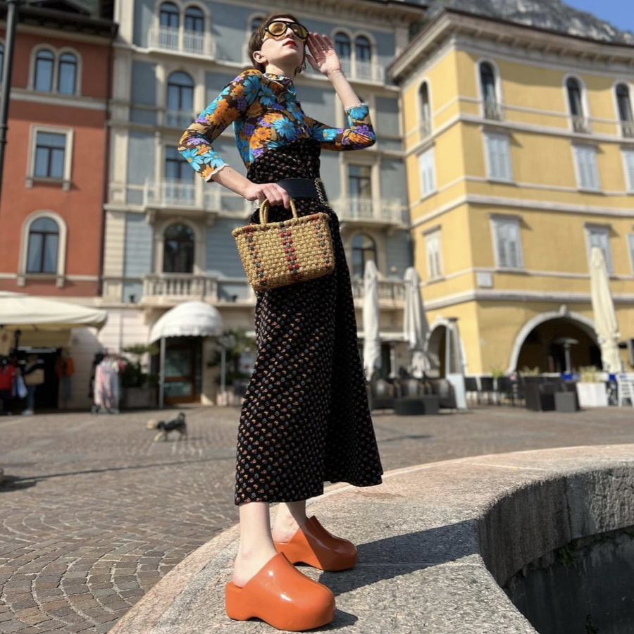 Judith Bradl wearing the clogs that are the best spring 22 trend.
