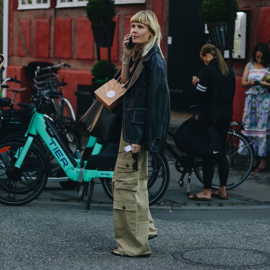 Chic fashionista wearing wide-leg cargo pants at Copenhagen fashion week