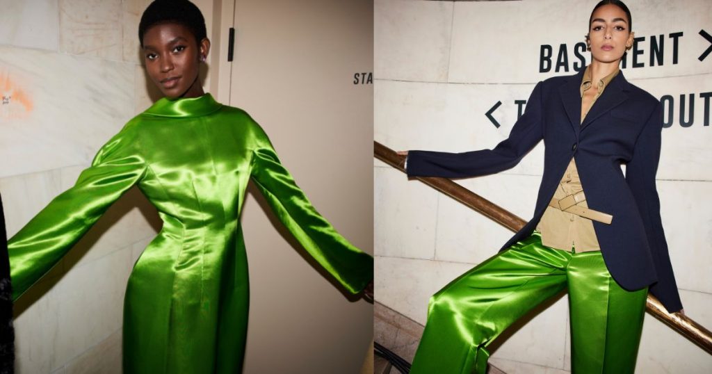 Tory Burch models wearing a green satin dress and trousers