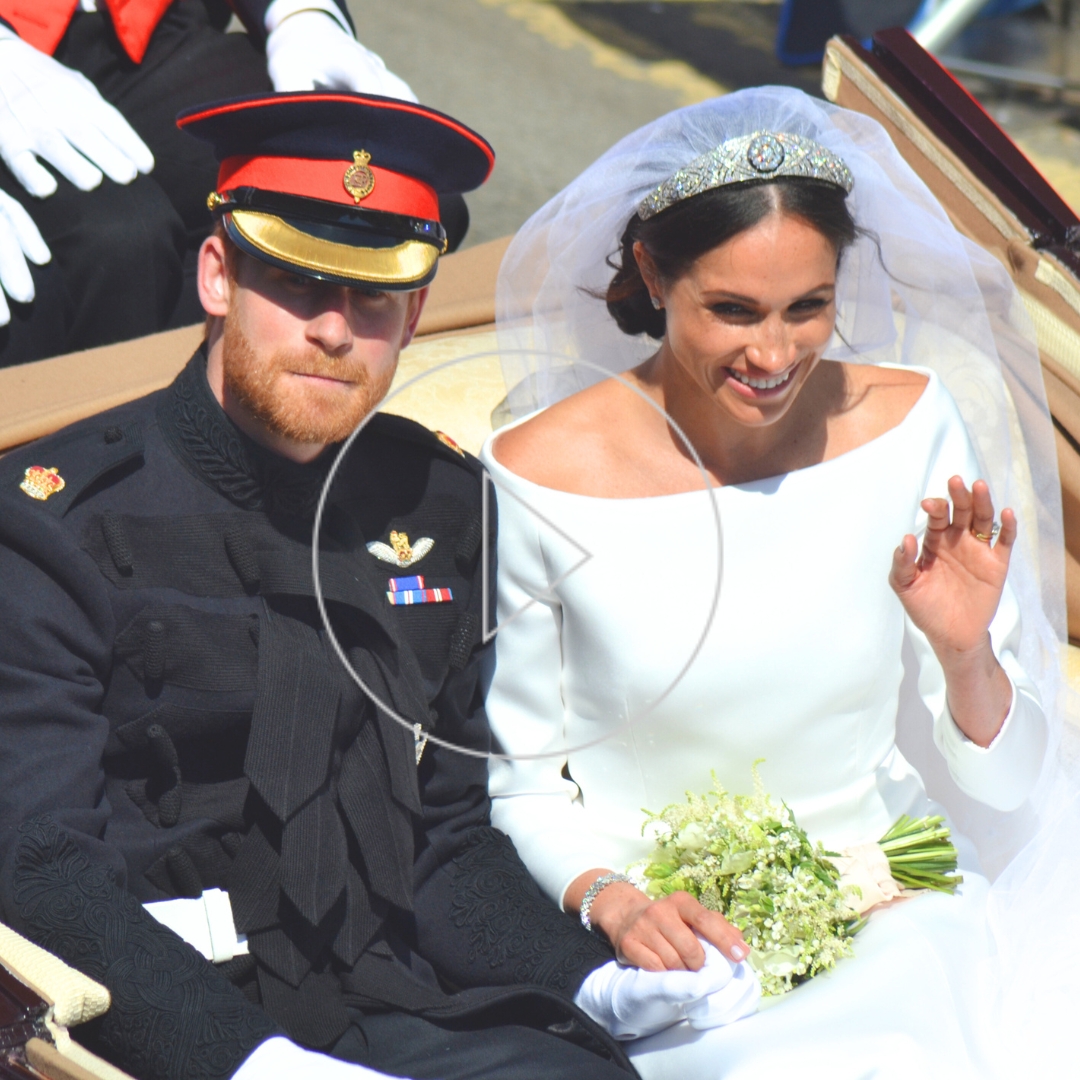Prince Harry and Meghan Markle greeting the people after their wedding