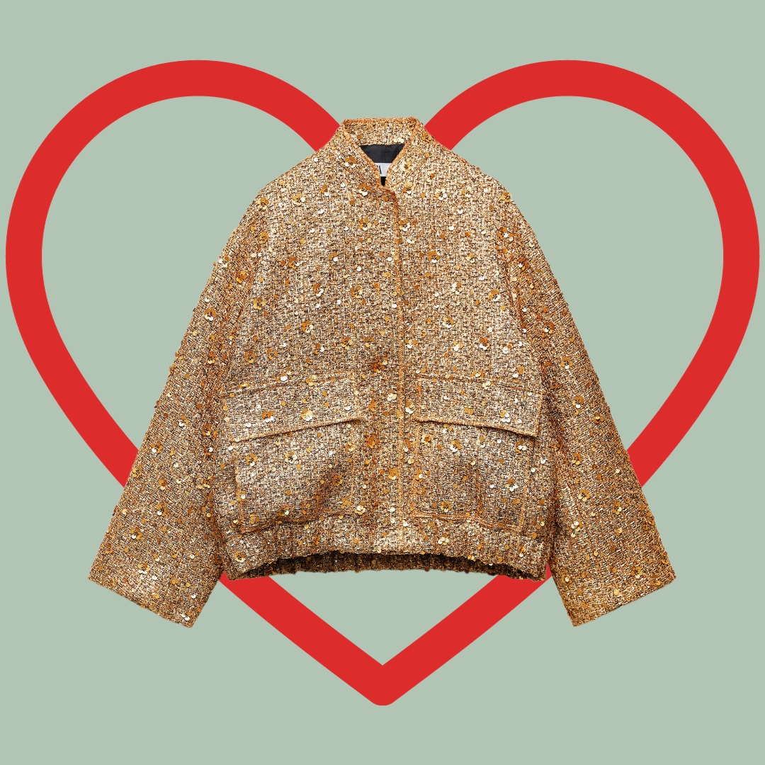 Zara Golden jacket and a big red heart in the background