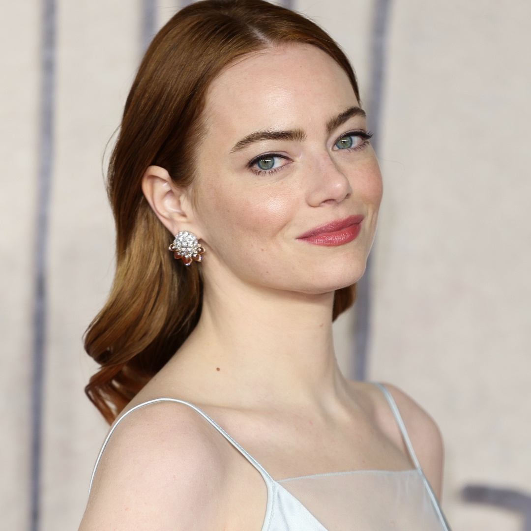 Emma Stone at the London Premier of Porr Things wearing a slip dress, one of the evening wear trends 2024